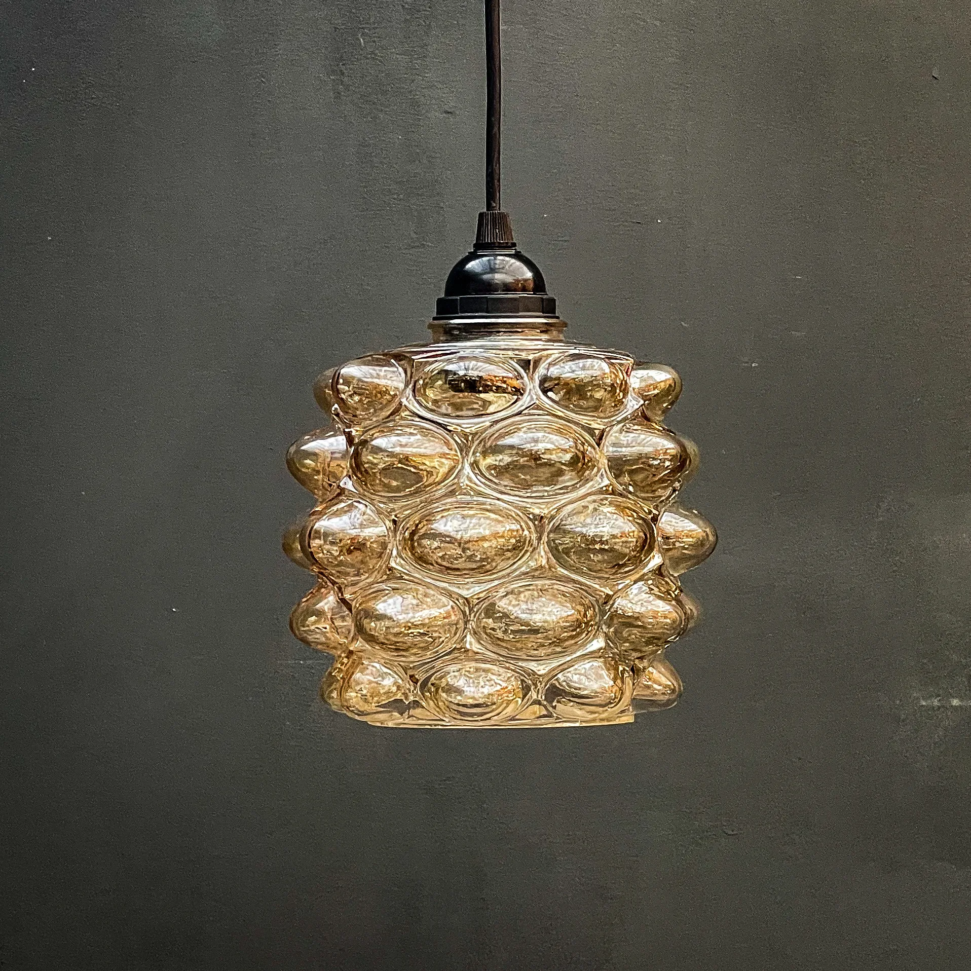 suspension ambrée verre transparent bulle
